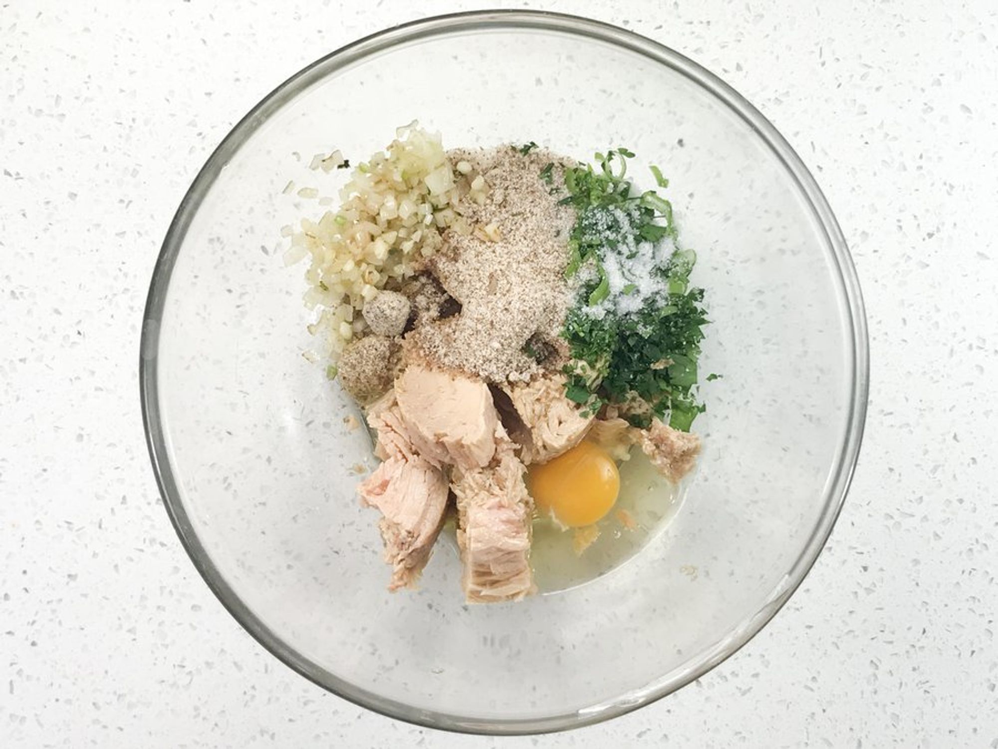 ingredients for mustard shallot tuna cakes in a mixing bowl