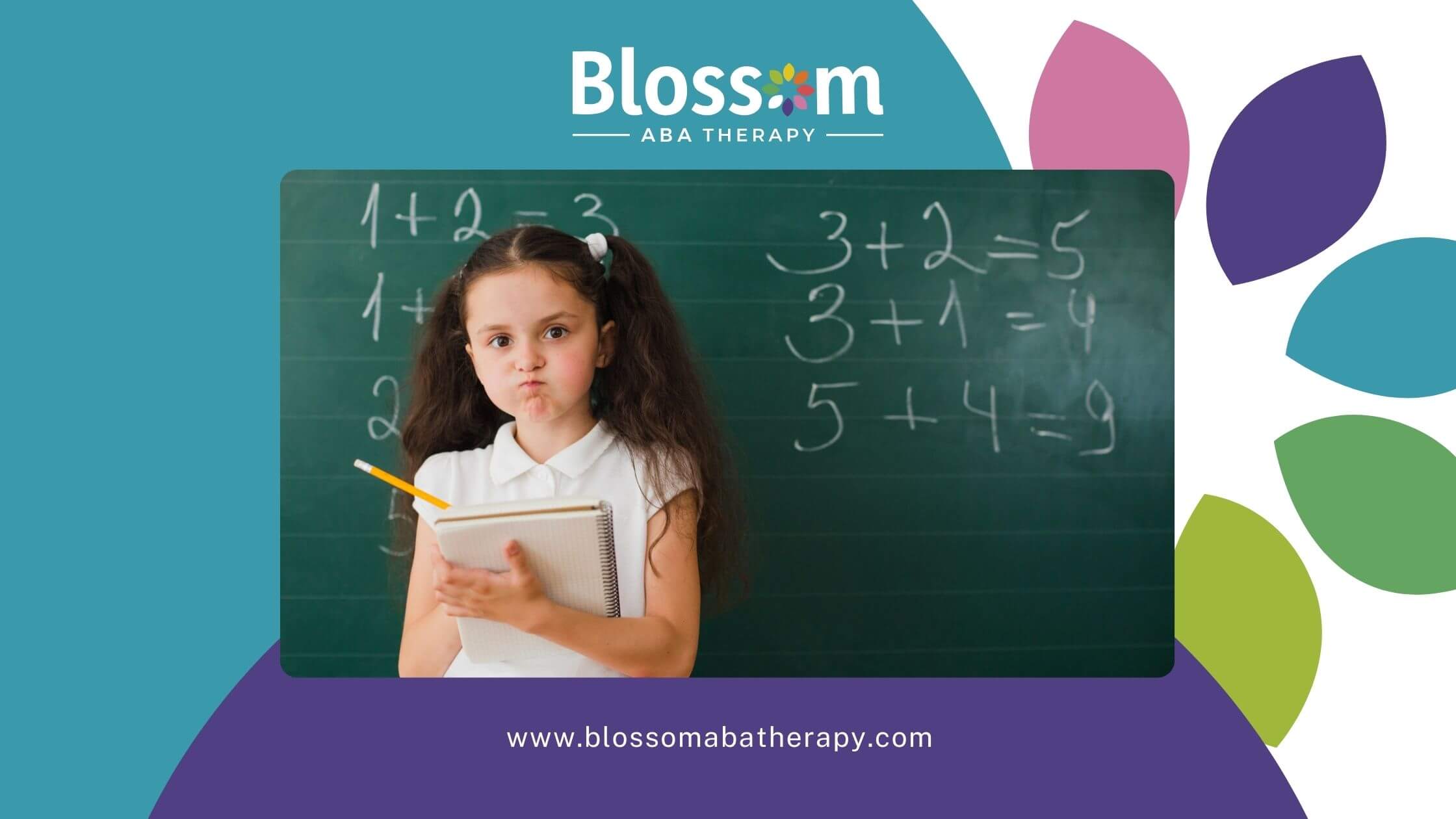Young girl with autism looking frustrated while holding a notebook in front of a math chalkboard.