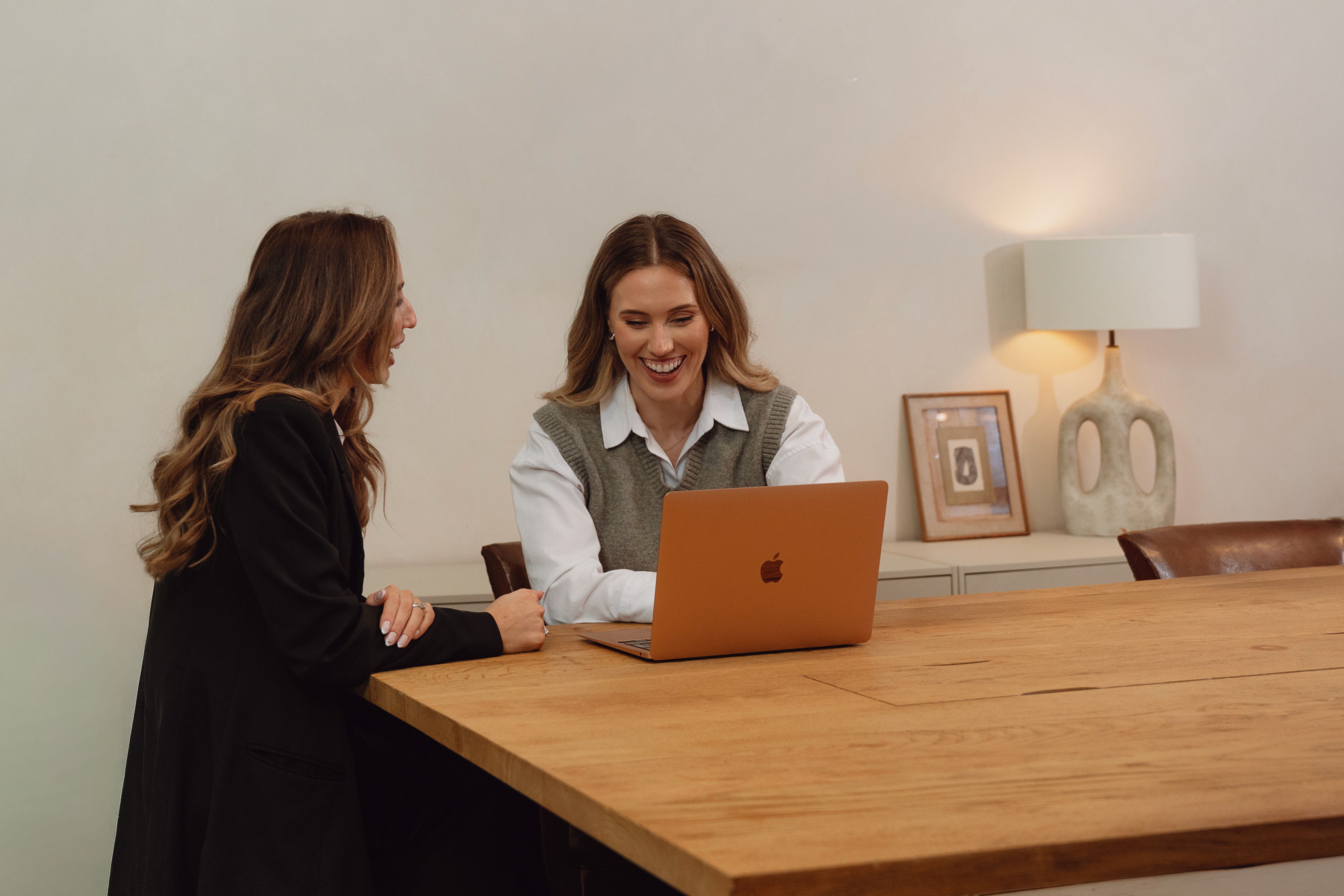 Woman holding laptop