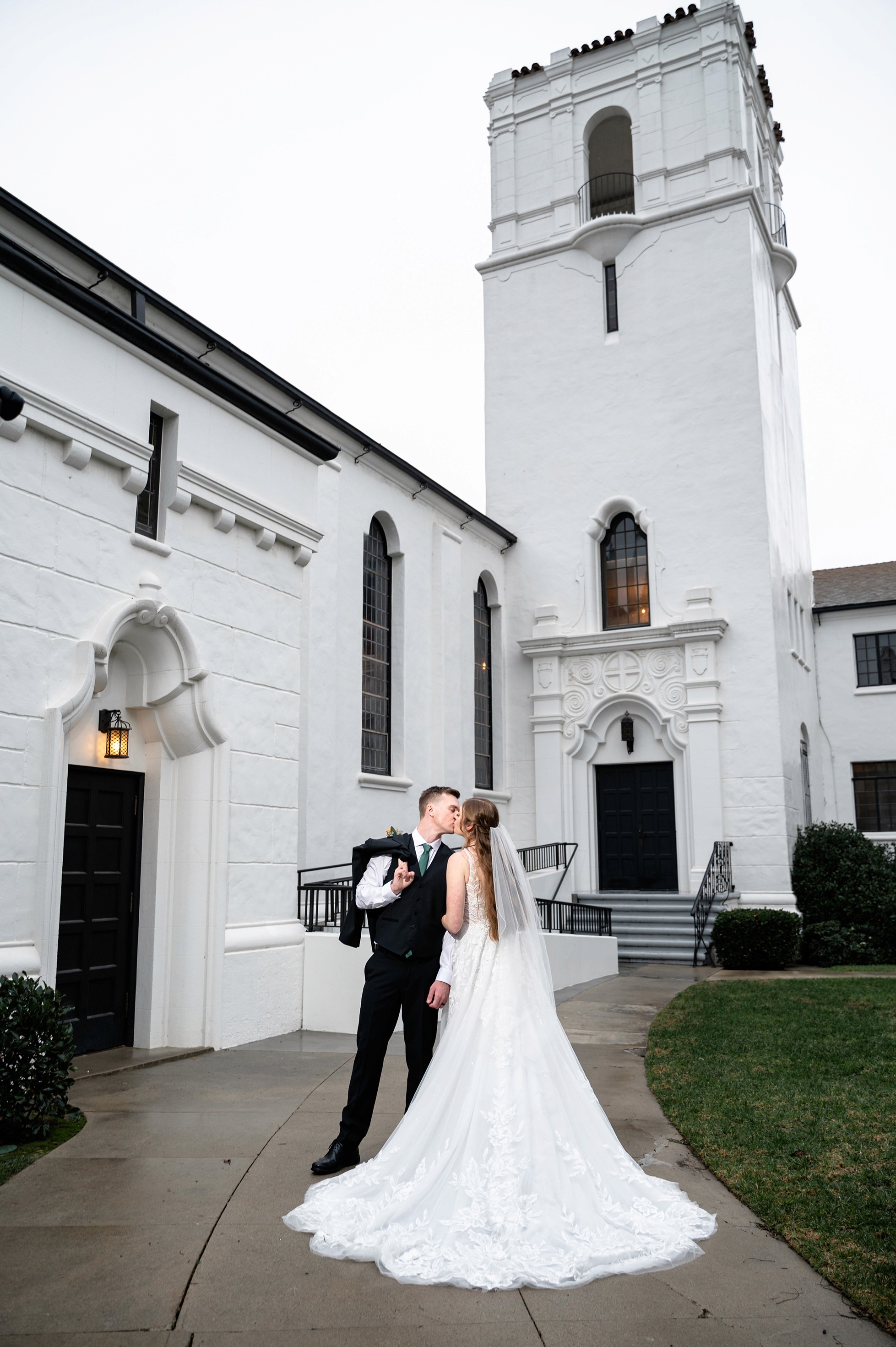Flat lay wedding details with bouquet, rings, and sparkling bridal heels
