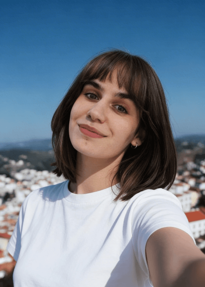 Redhead woman in yellow dress.