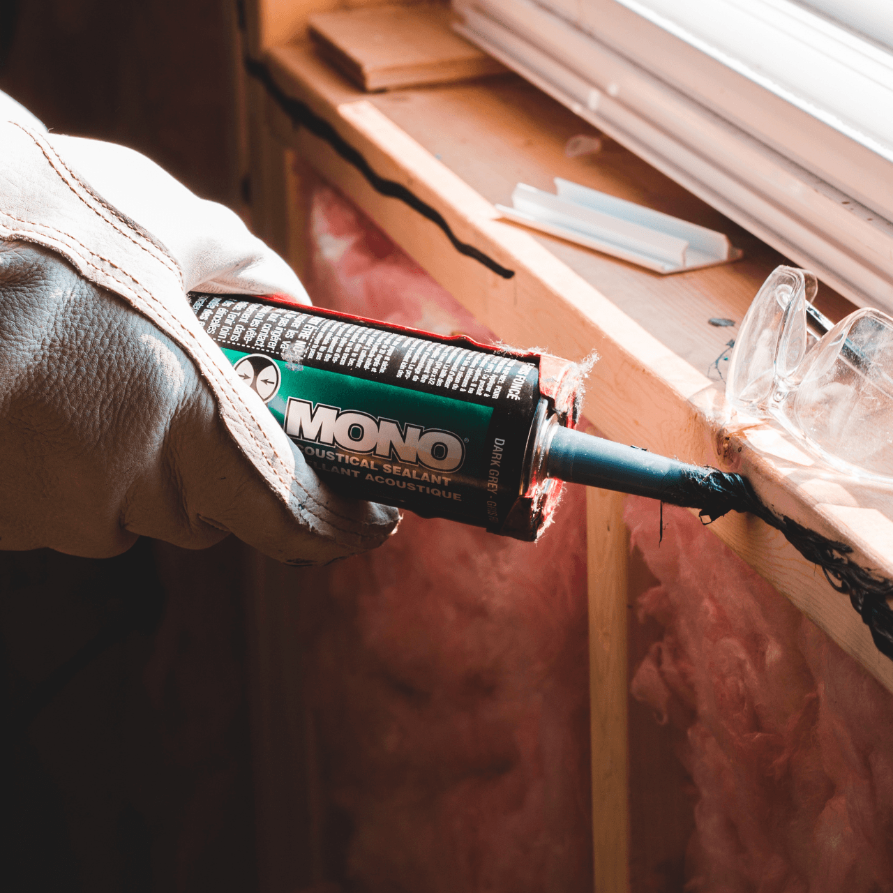 two people looking at a tablet and smiling