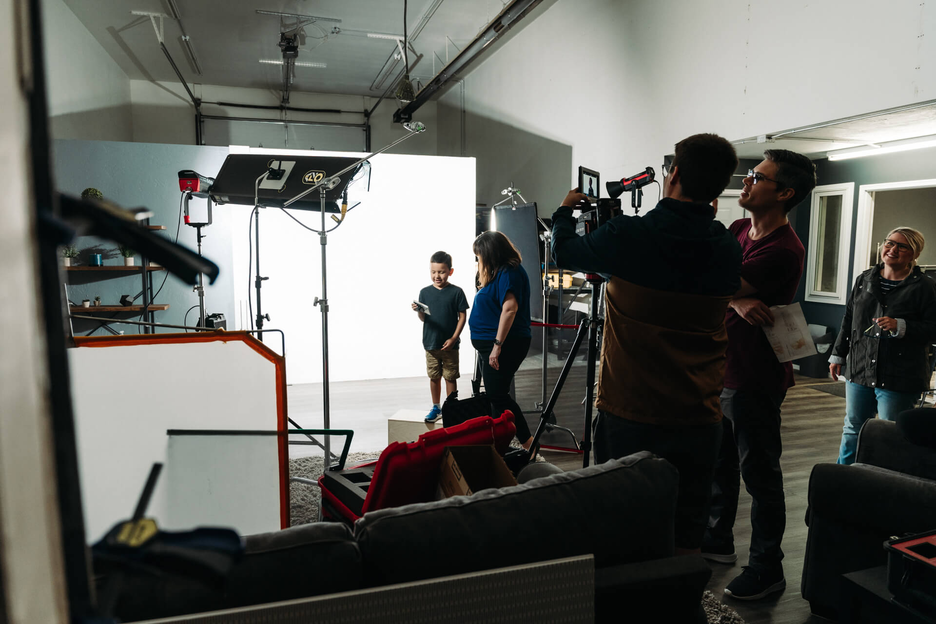 Camera set up with people working around it