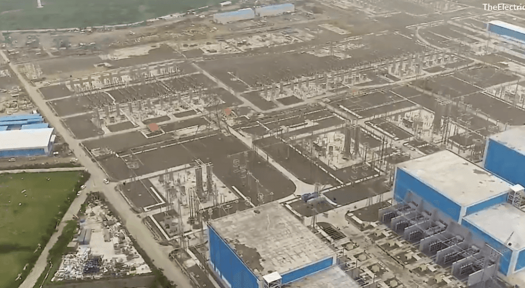Aerial view of an HVDC converter station showing its large land footprint