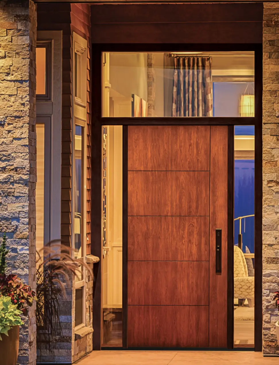 Entry door in cherry with black hardware and clear glass