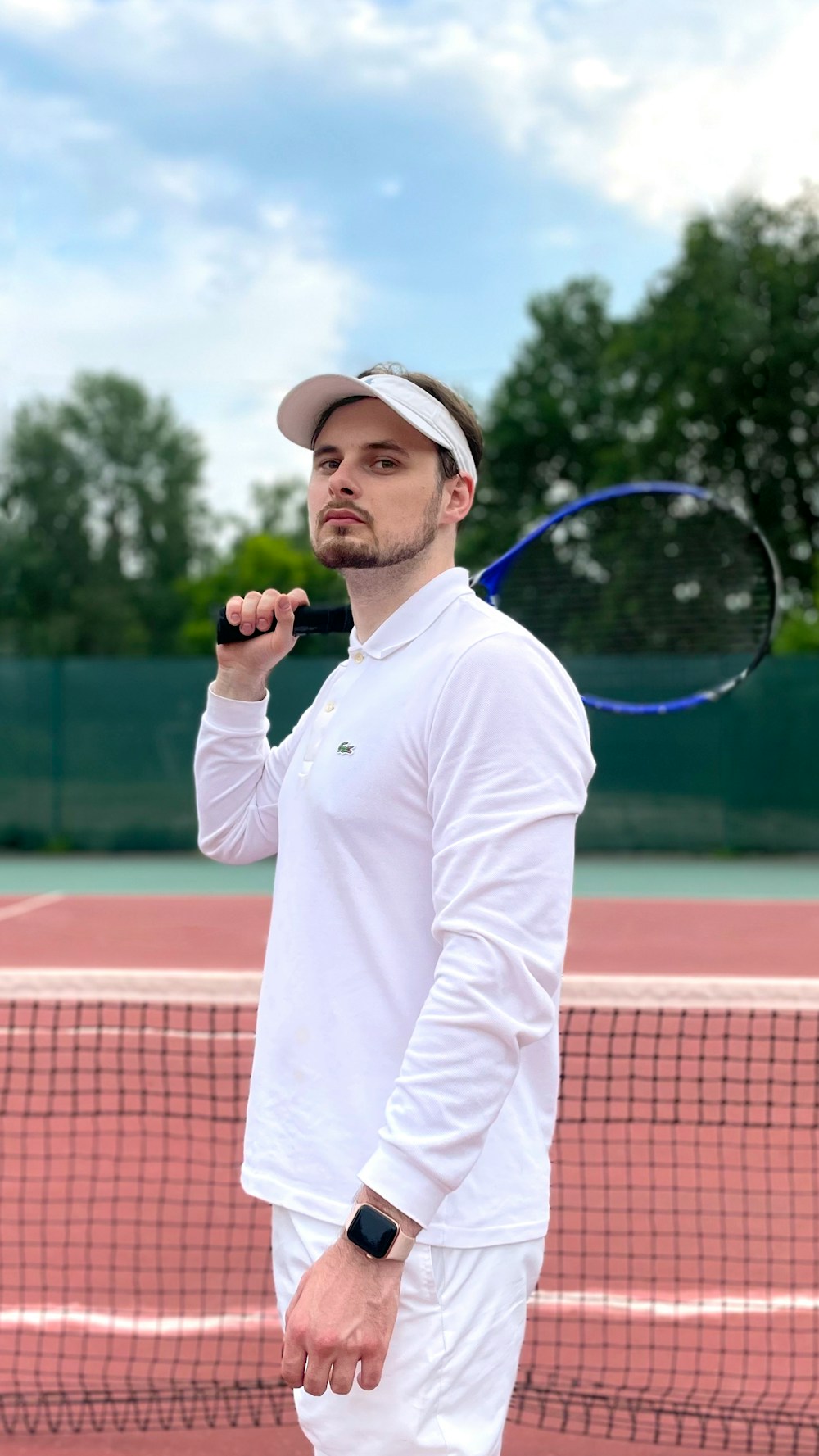 Portrait of Callum Price on court with a racket