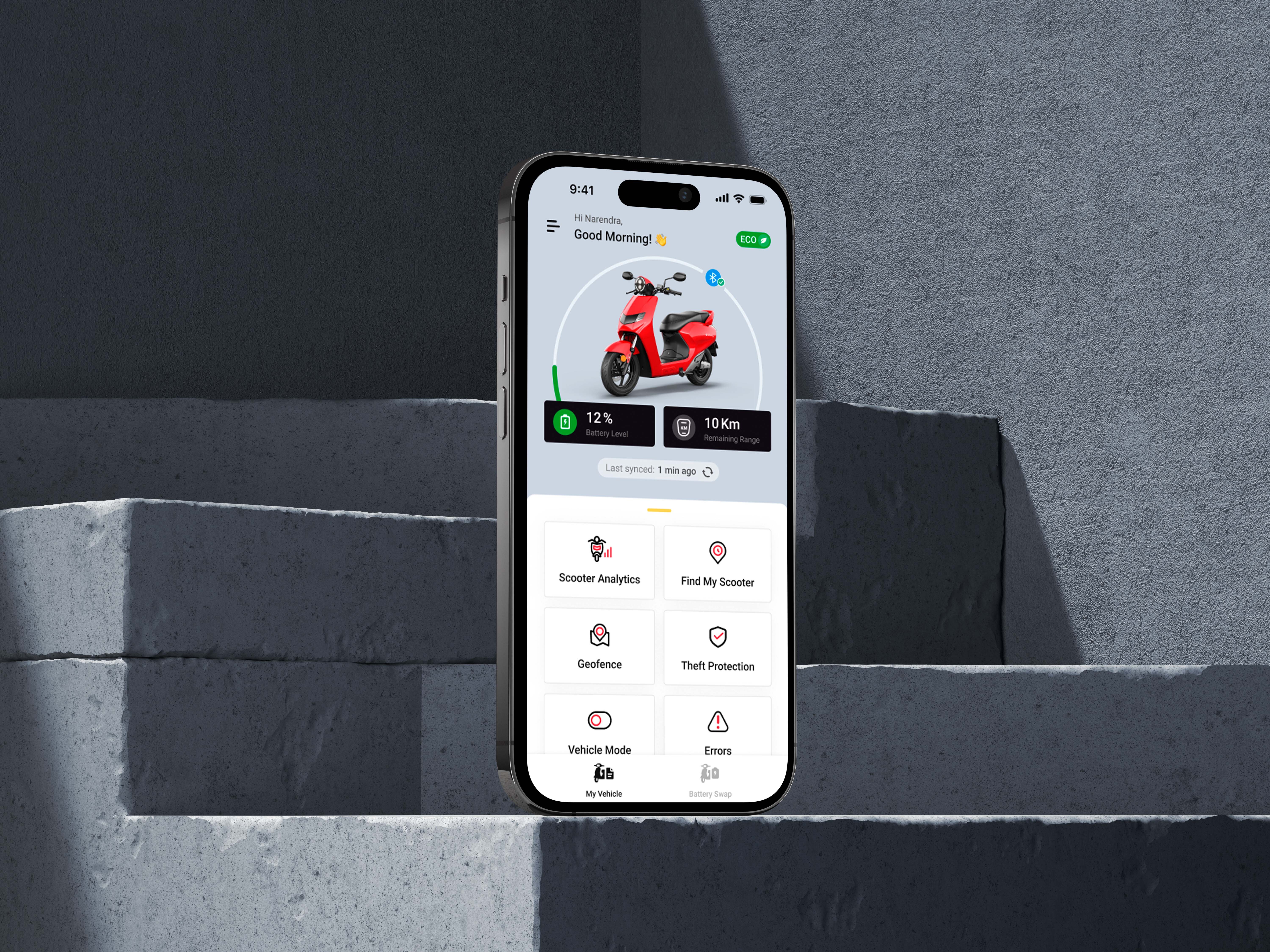  Mobile screen showing scooter dashboard with battery level, ride stats, and quick-access features.