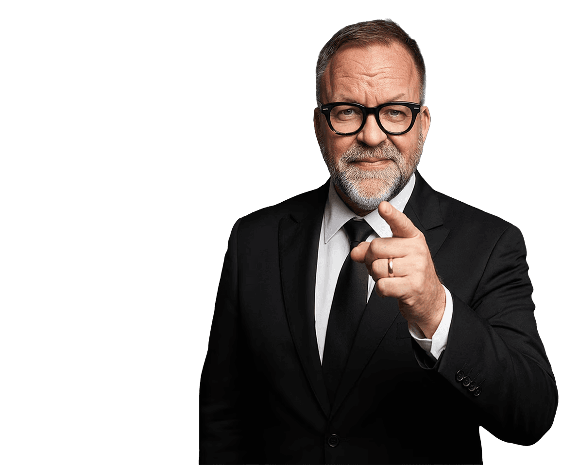 A man with ear buds in a gym