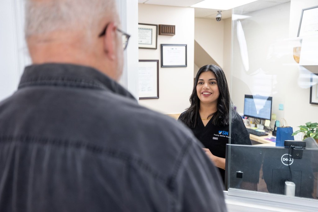 Patient receiving consultation at Newark & Milltown dental practice