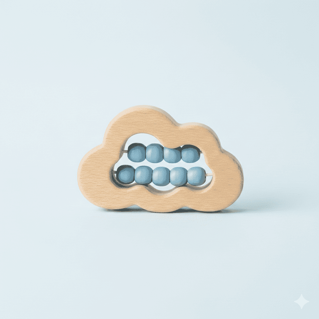 Handcrafted cloud-shaped wooden rattle made from light birch wood with smooth, rounded edges for infants.