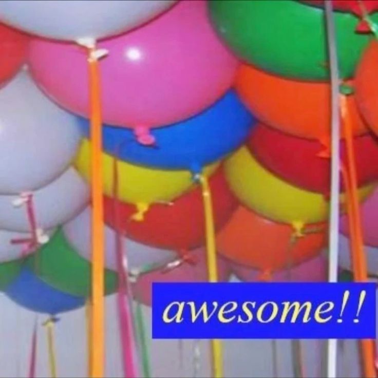 Colorful balloons with the word awesome in a retro blue caption box, representing the best case scenario of a successful Windows 11 upgrade
