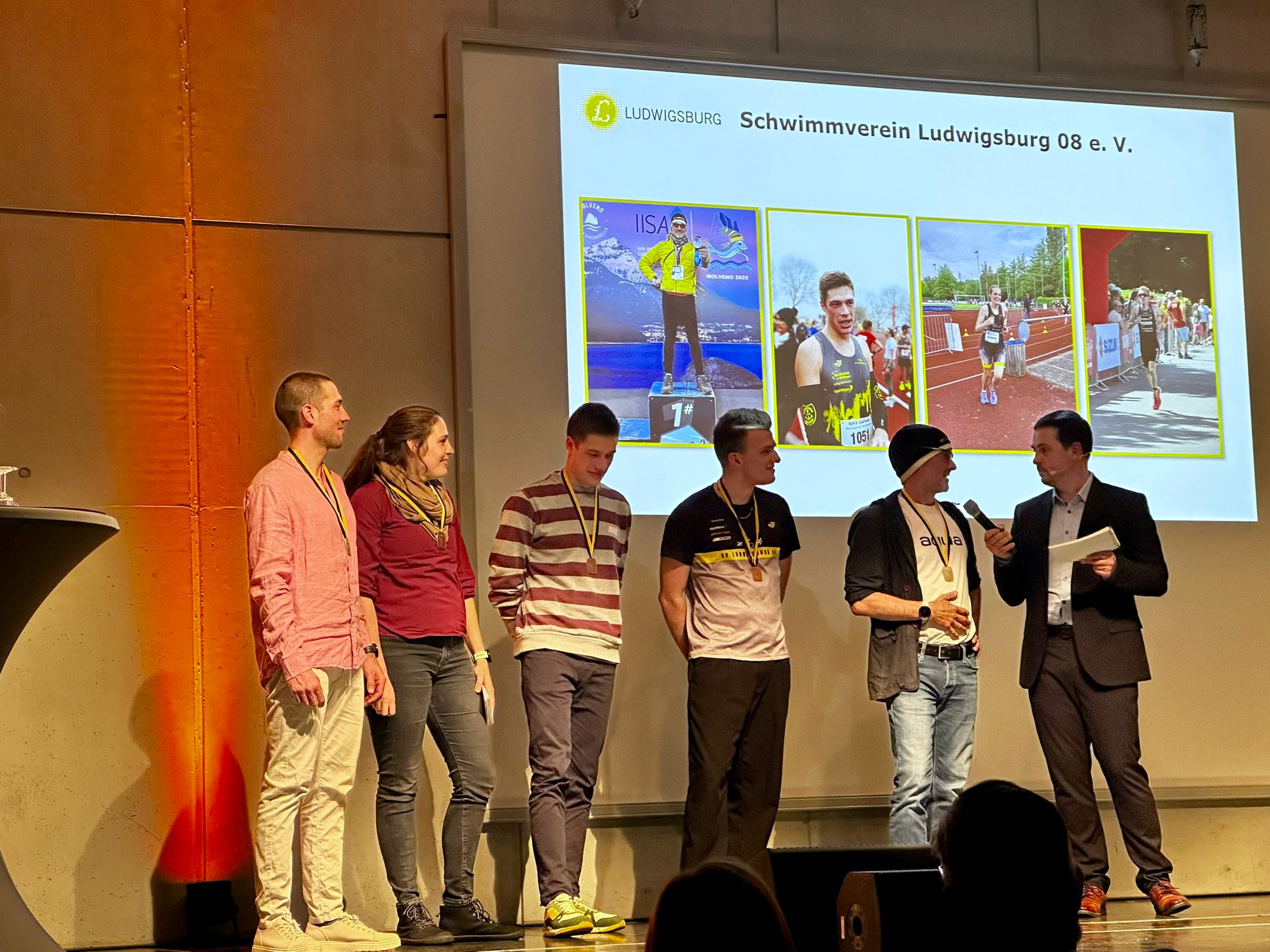 five people swimming on pool