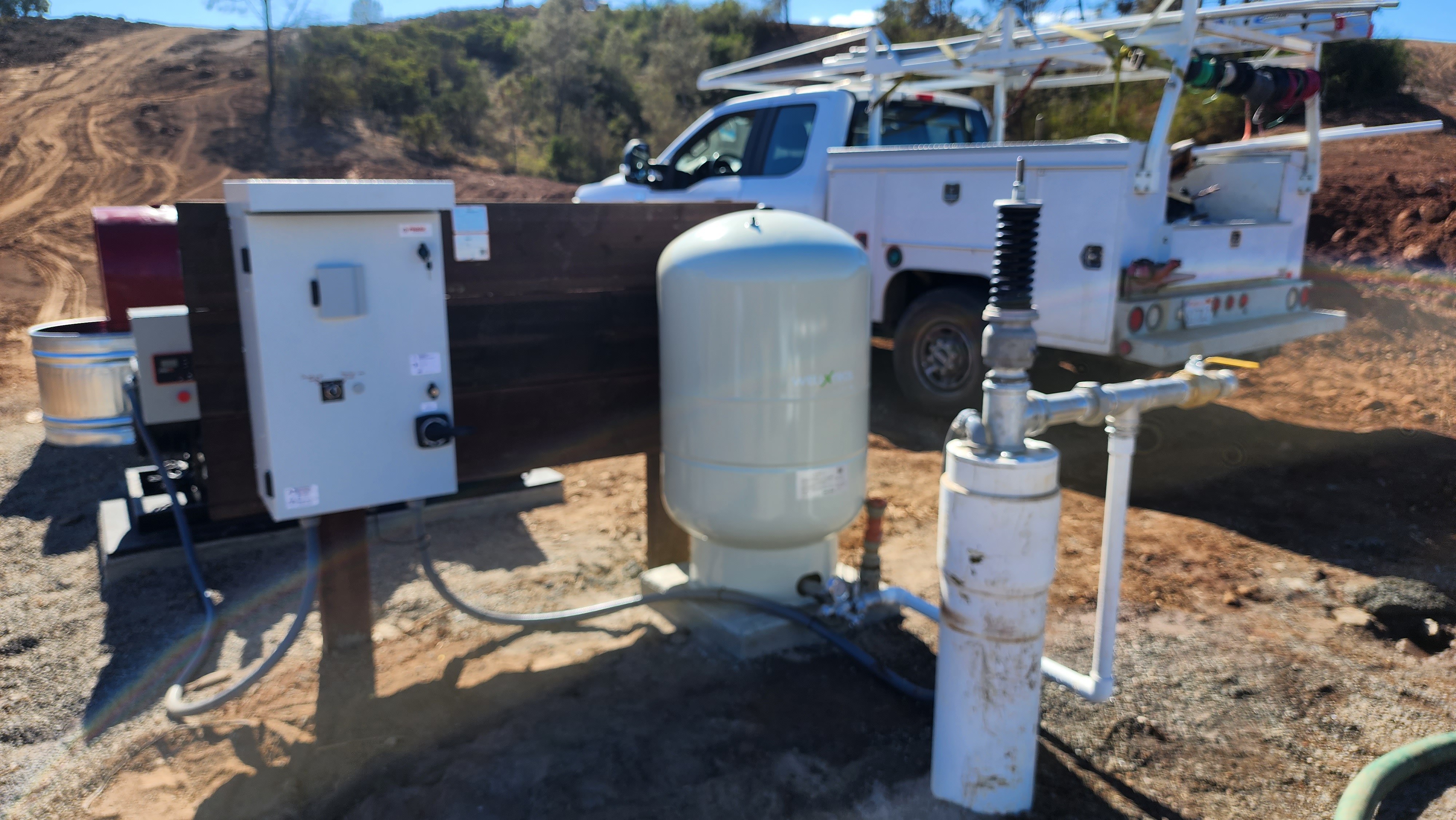 West Coast Well and Pump service truck at a well installation
