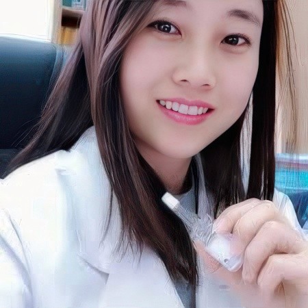 a woman standing in front of a building