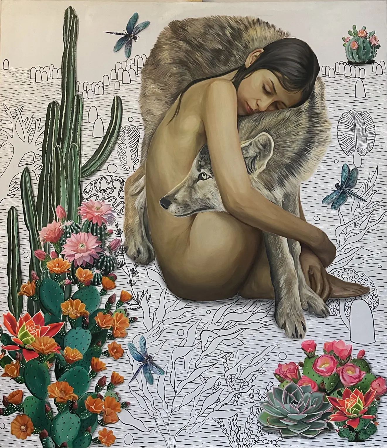 A serene painting of a nude woman curled around a wolf in a protective embrace, set against a partially illustrated desert background with blooming cacti, dragonflies, and succulents.