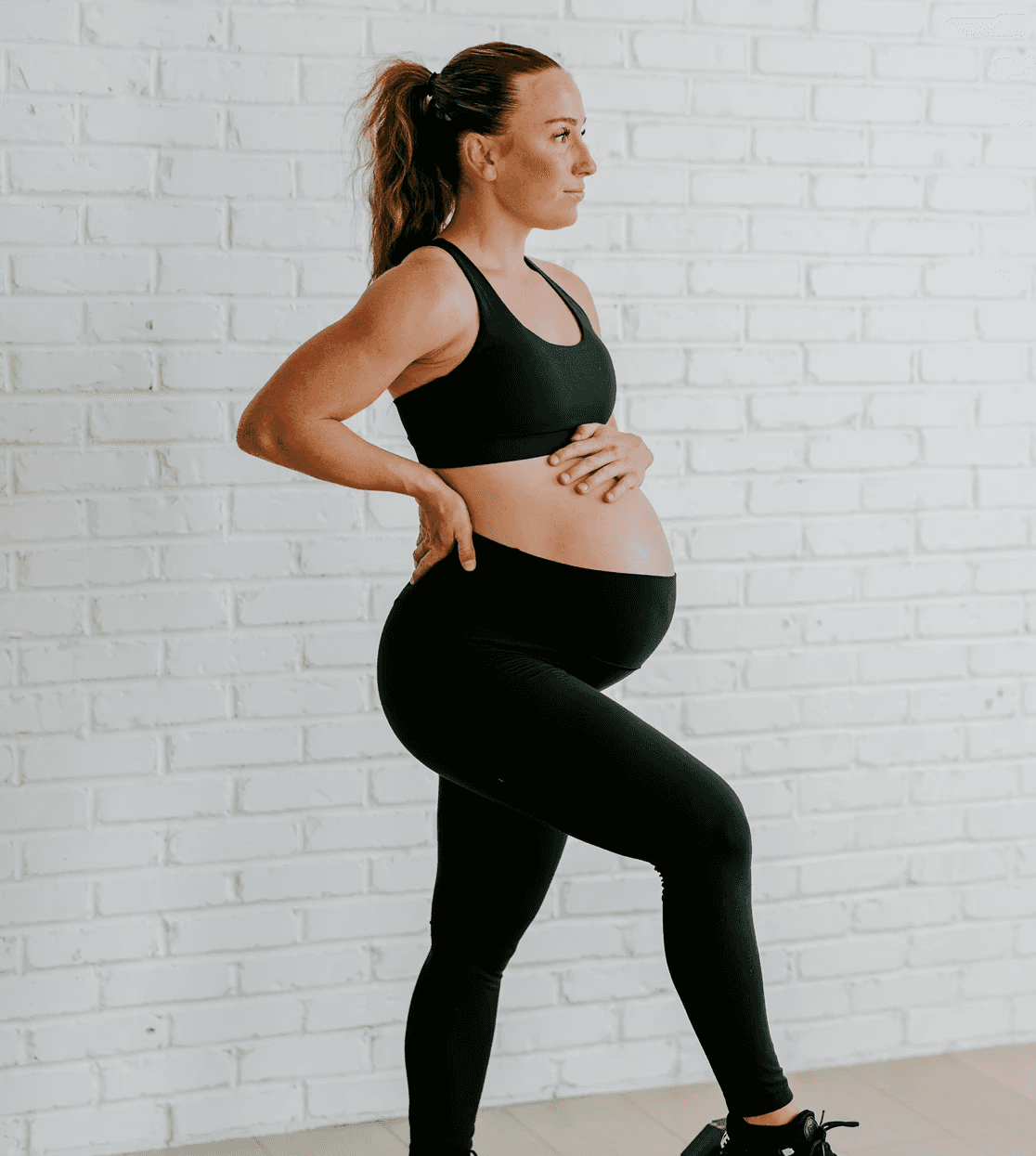 A person reviewing fitness activity on a mobile device inside a modern gym space, reflecting workout tracking, progress insights, and clear activity results.