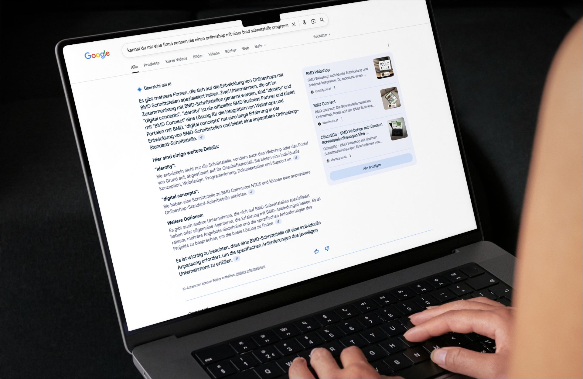Google-Suche zeigt KI-Antwort mit identity als GEO-Agentur in Linz – gelistet durch relevanten Content zu BMD-Webshops.
