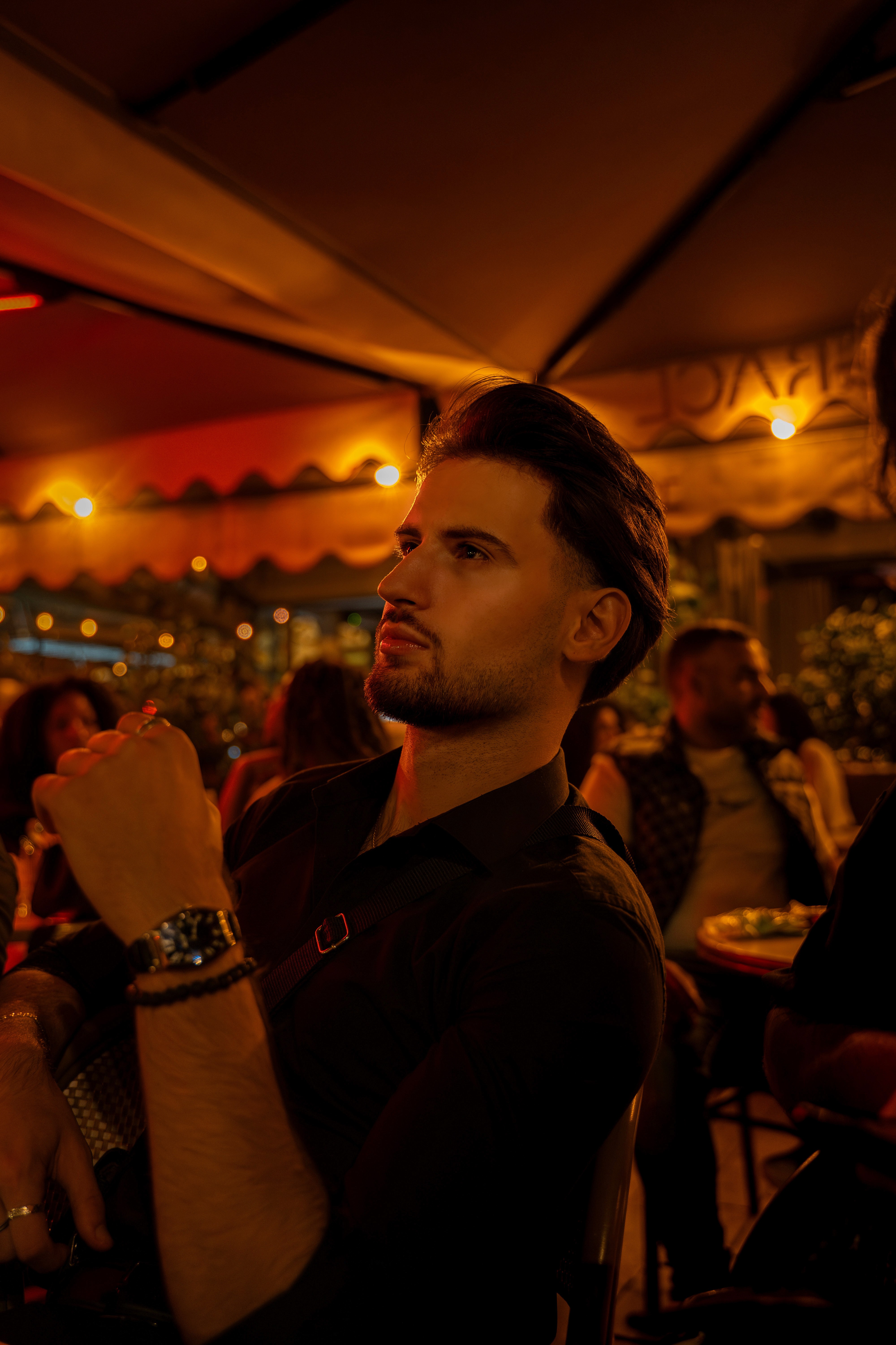 Serene woman with leaf shadows