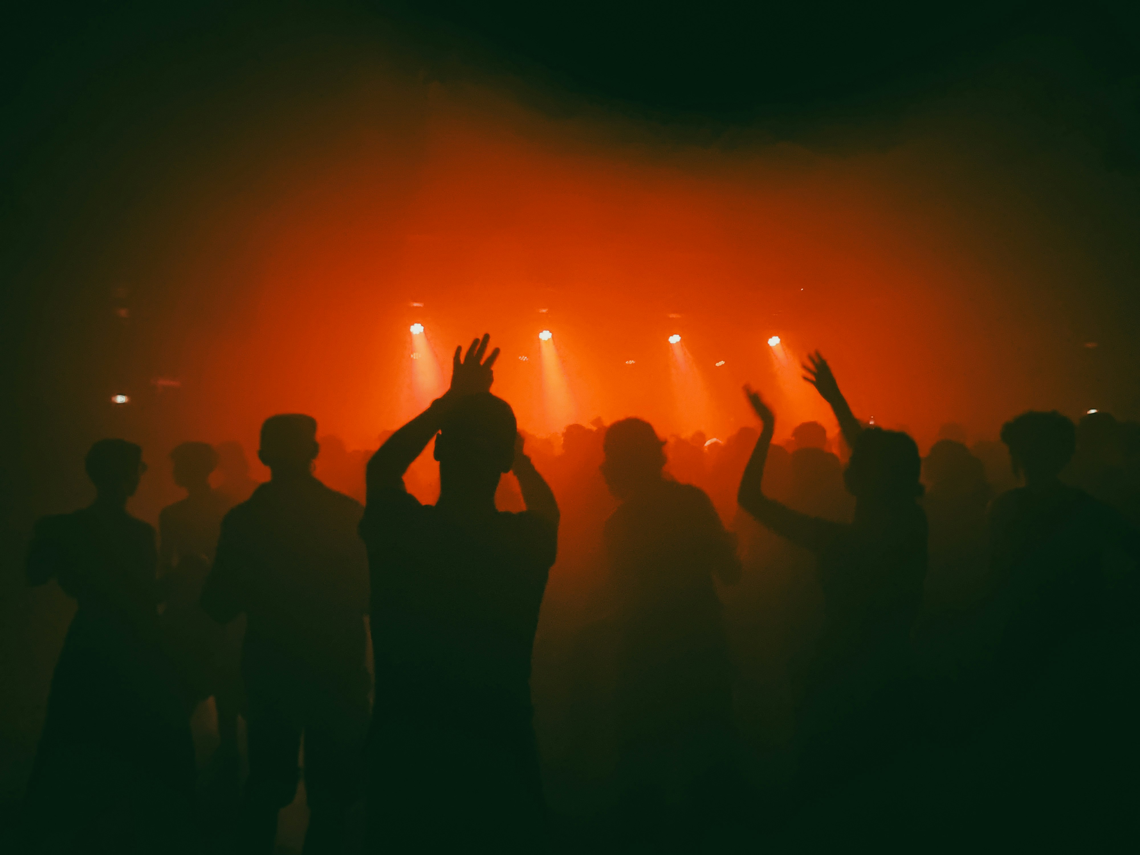 A group of people standing on top of a stage