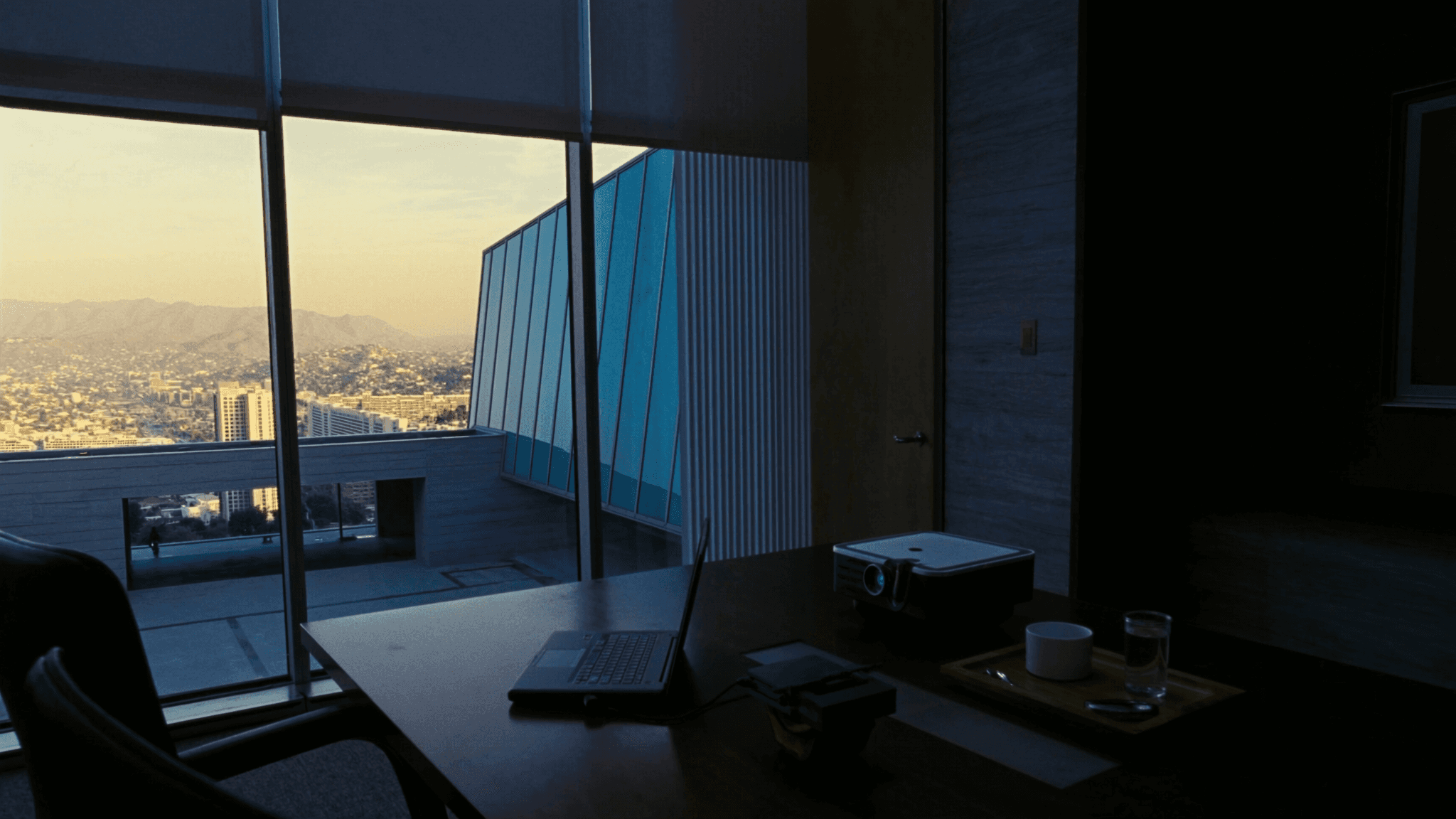 Professional meeting room with city skyline view set up for a presentation