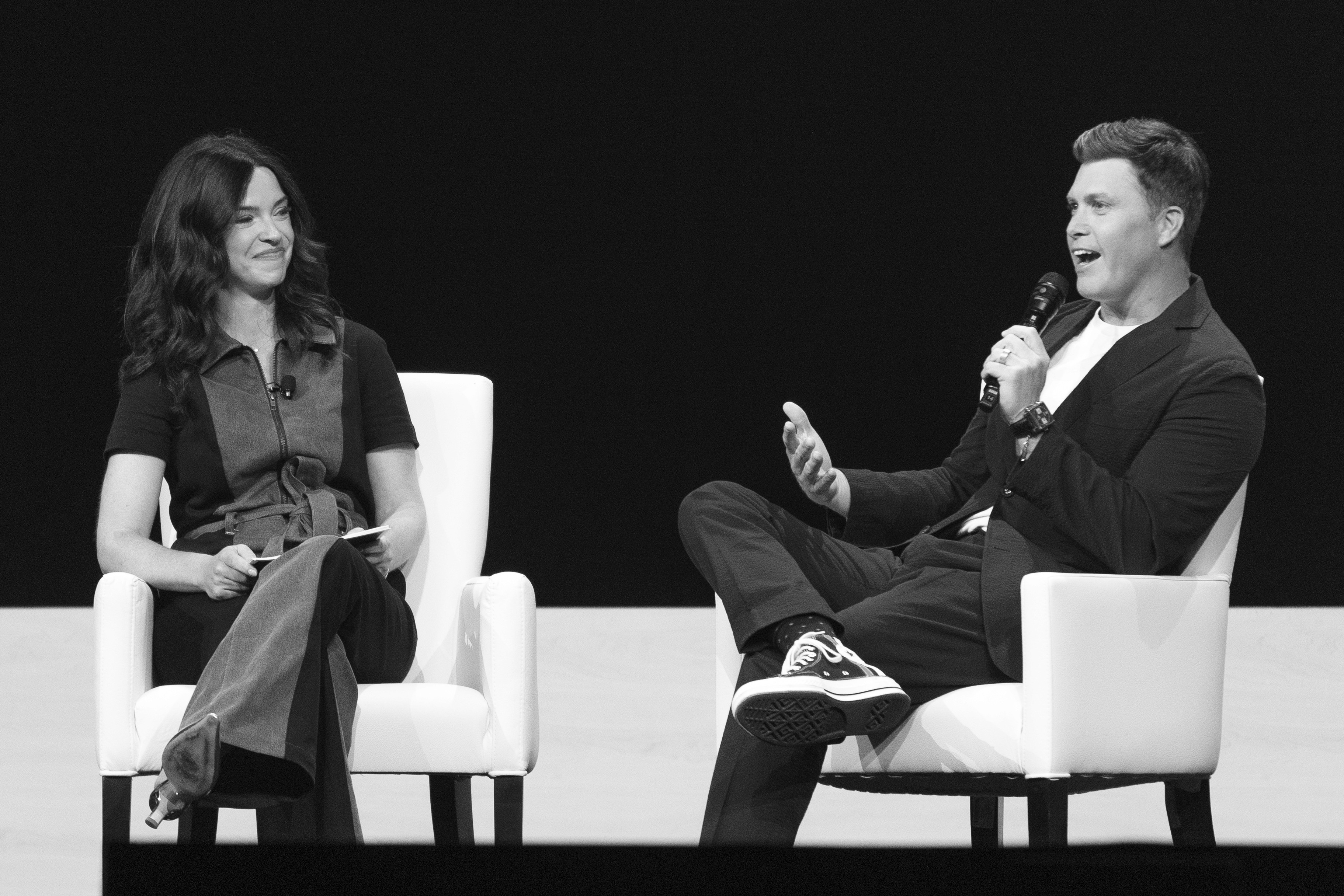 Team working in an office watching at a presentation