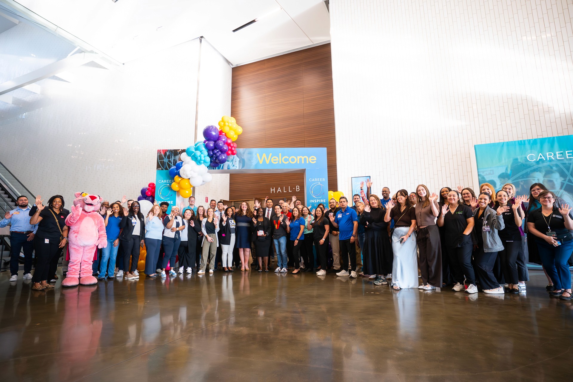 photograph of the career inspire career fair event in Las Colinas, showcasing the team and sponsors who helped put it together at the Irving Convention center.