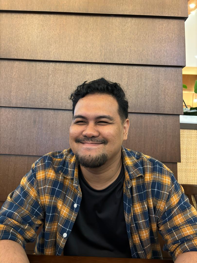 a person wearing a lumberjack shirt