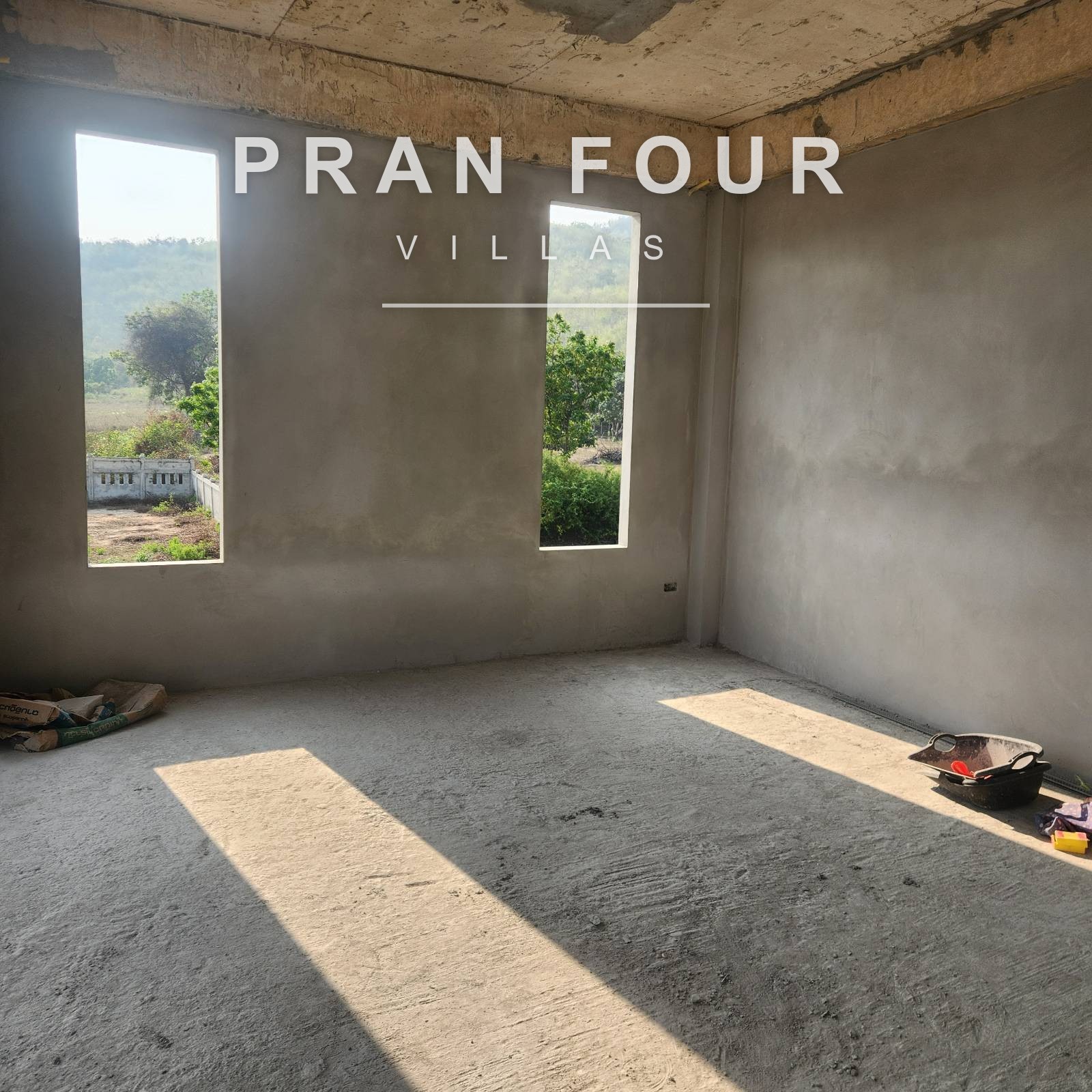 Bedroom with morning light and mountain windows