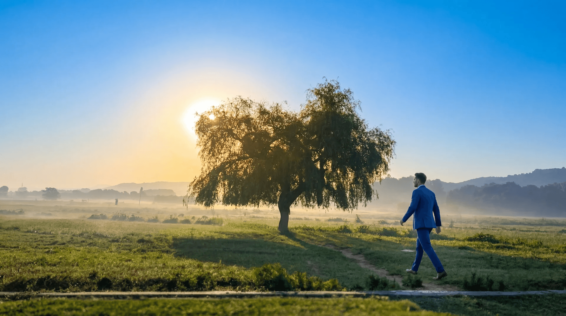 woman holding a phone and man looking at the phone. both are smiling