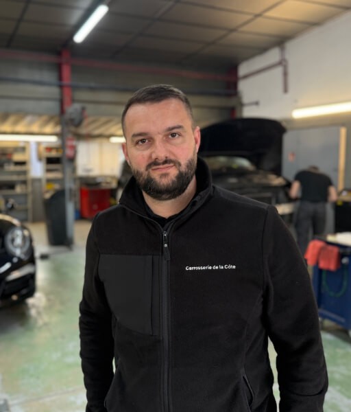 person sitting in a chair in front of a man