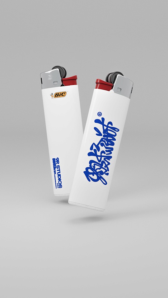 Custom white BIC lighters featuring 9R Studios branding and bold blue graffiti-style typography. A sleek promotional design blending street culture aesthetics with modern brand identity, showcasing high-quality merchandise and creative branding solutions.