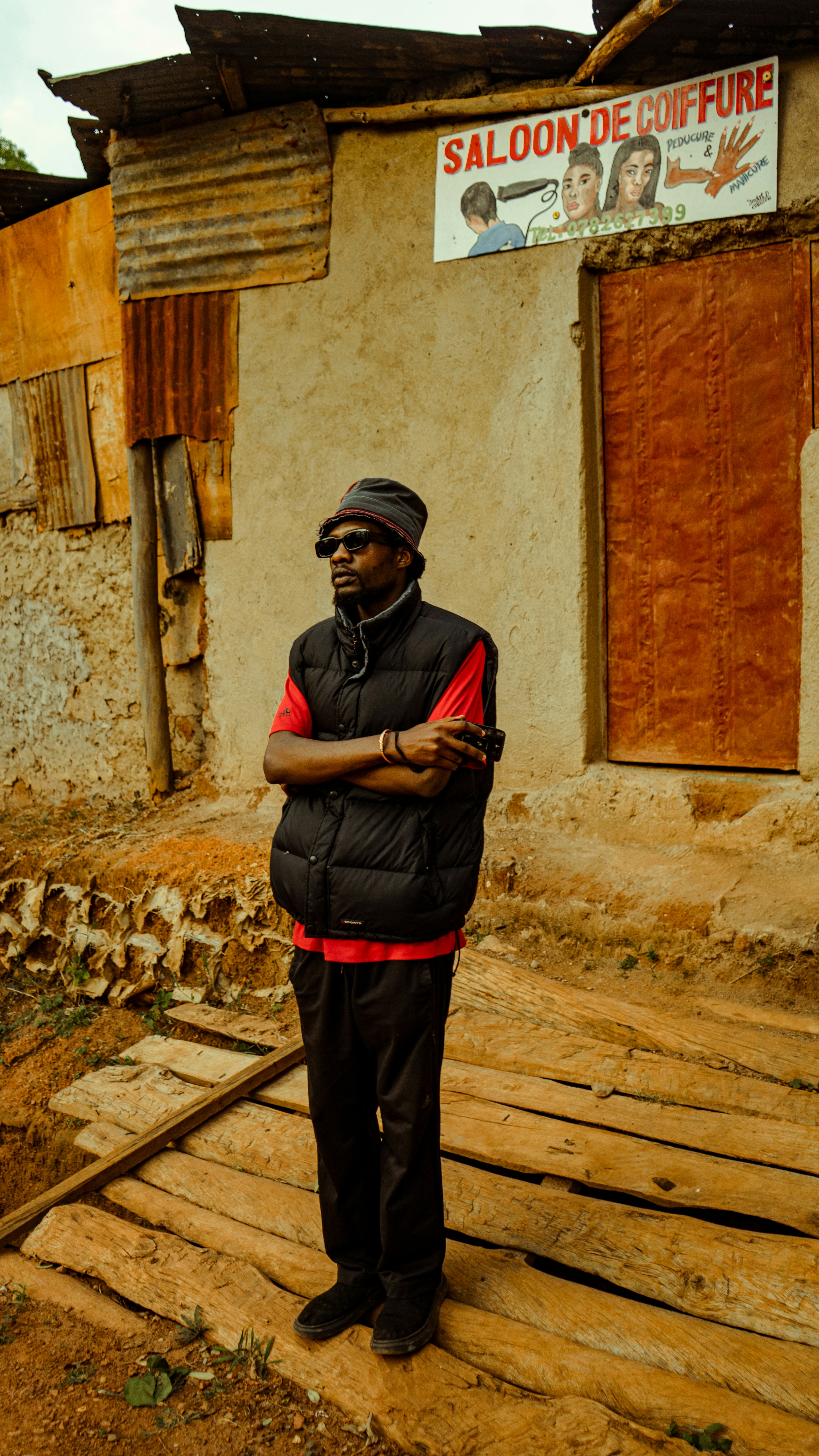 a man standing in front of a building
