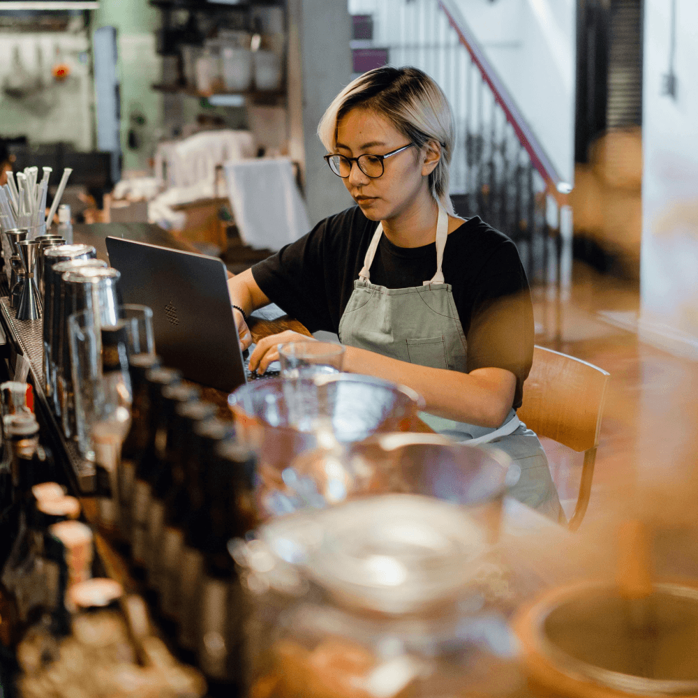small business owner using her laptop