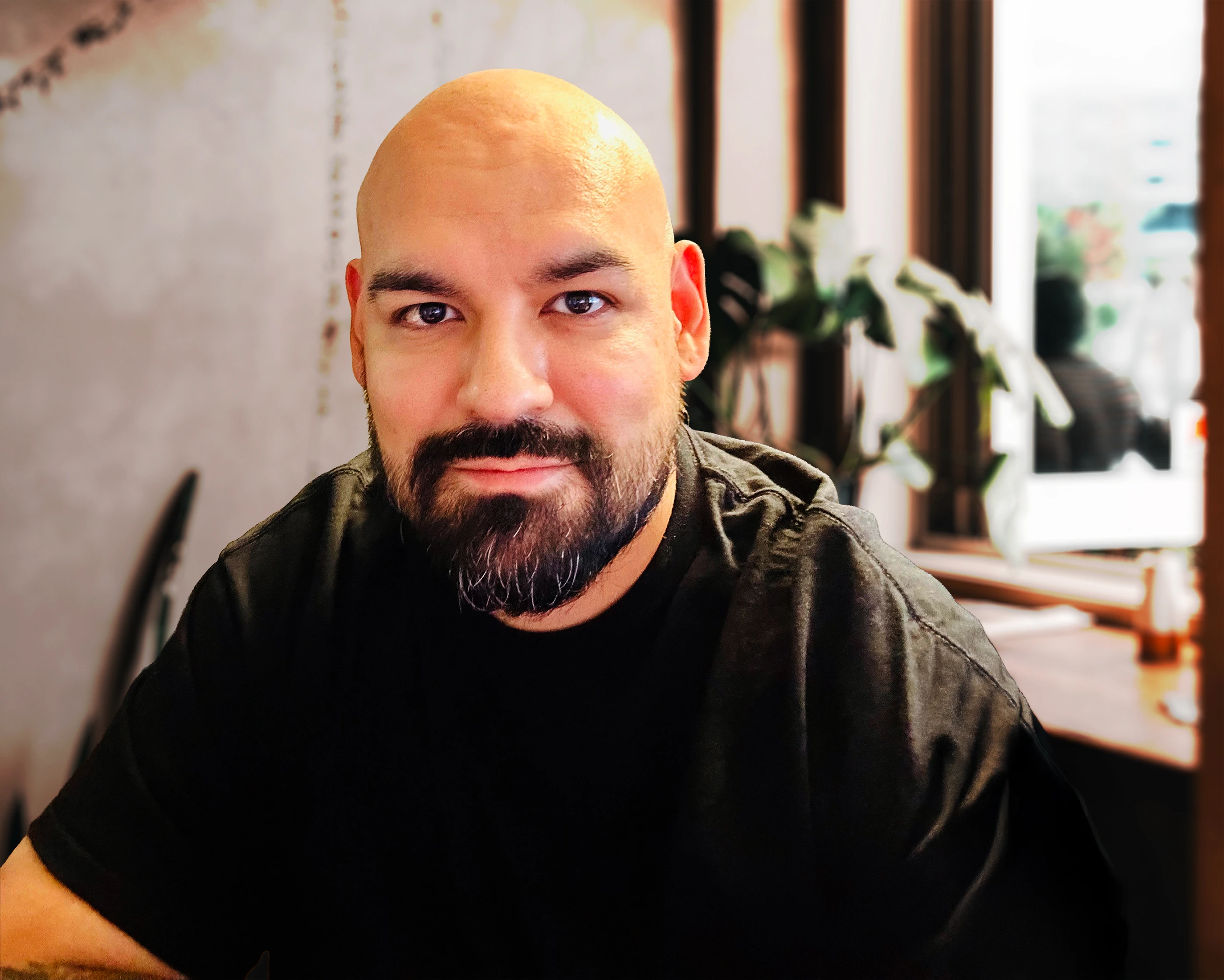 image of David Saa in a cafe