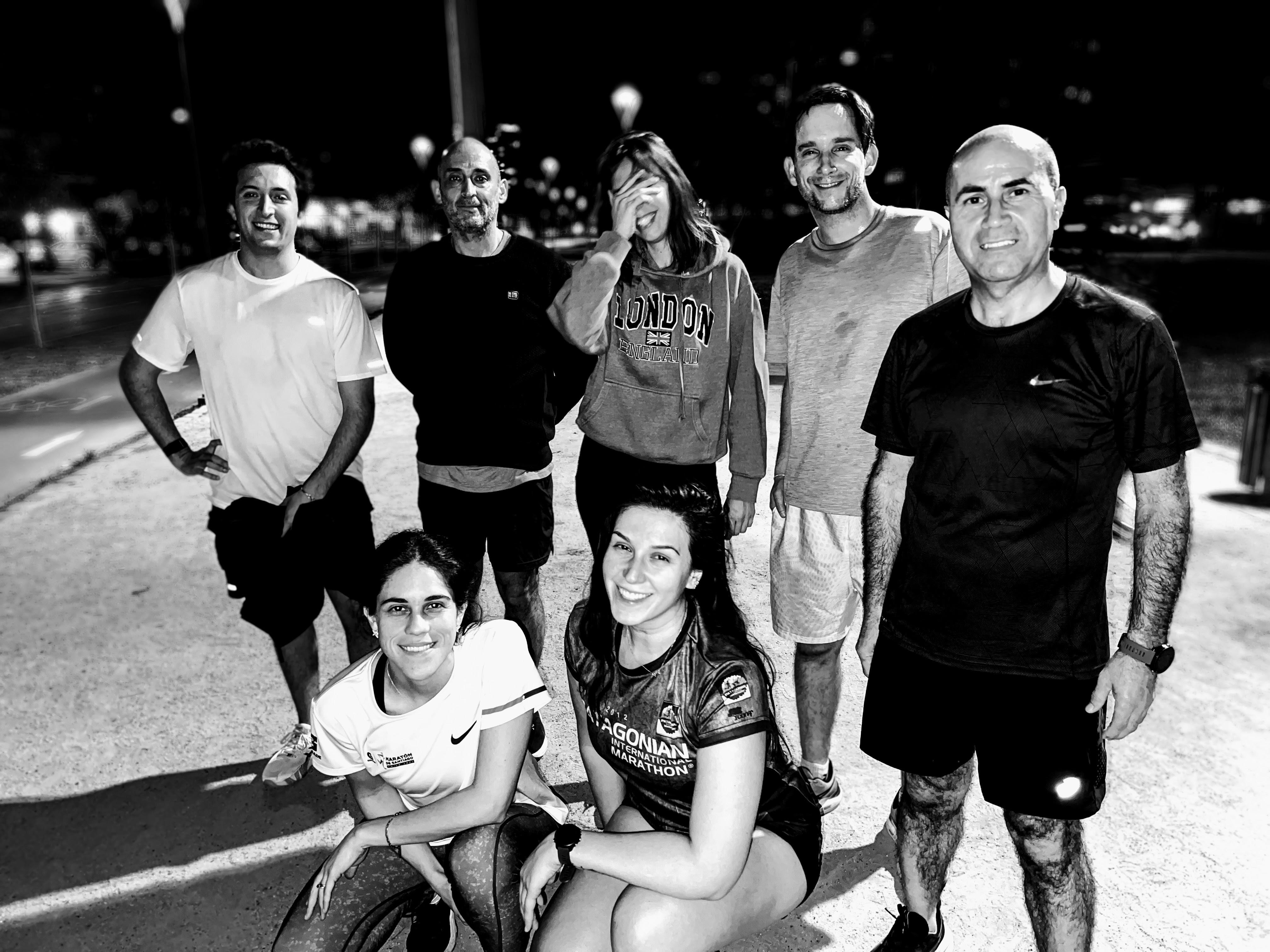 Group of people relaxing outdoors on a field or lawn