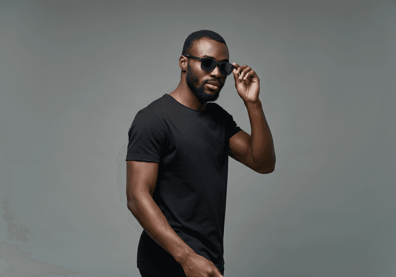 Portrait shot of a man wearing black sunglasses.