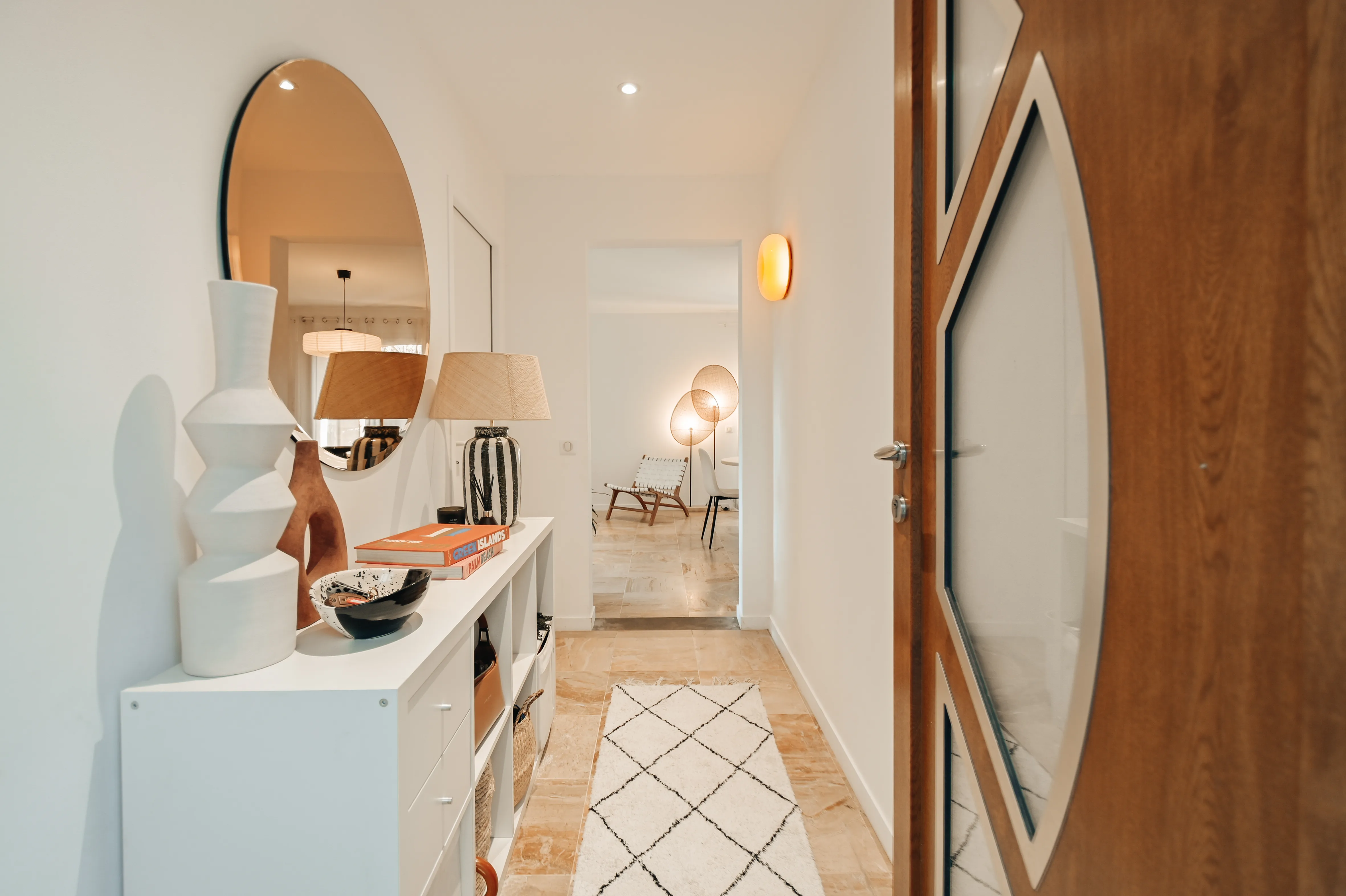 Streetside billboard with flyposters of the Batch.Works brand and illustrations