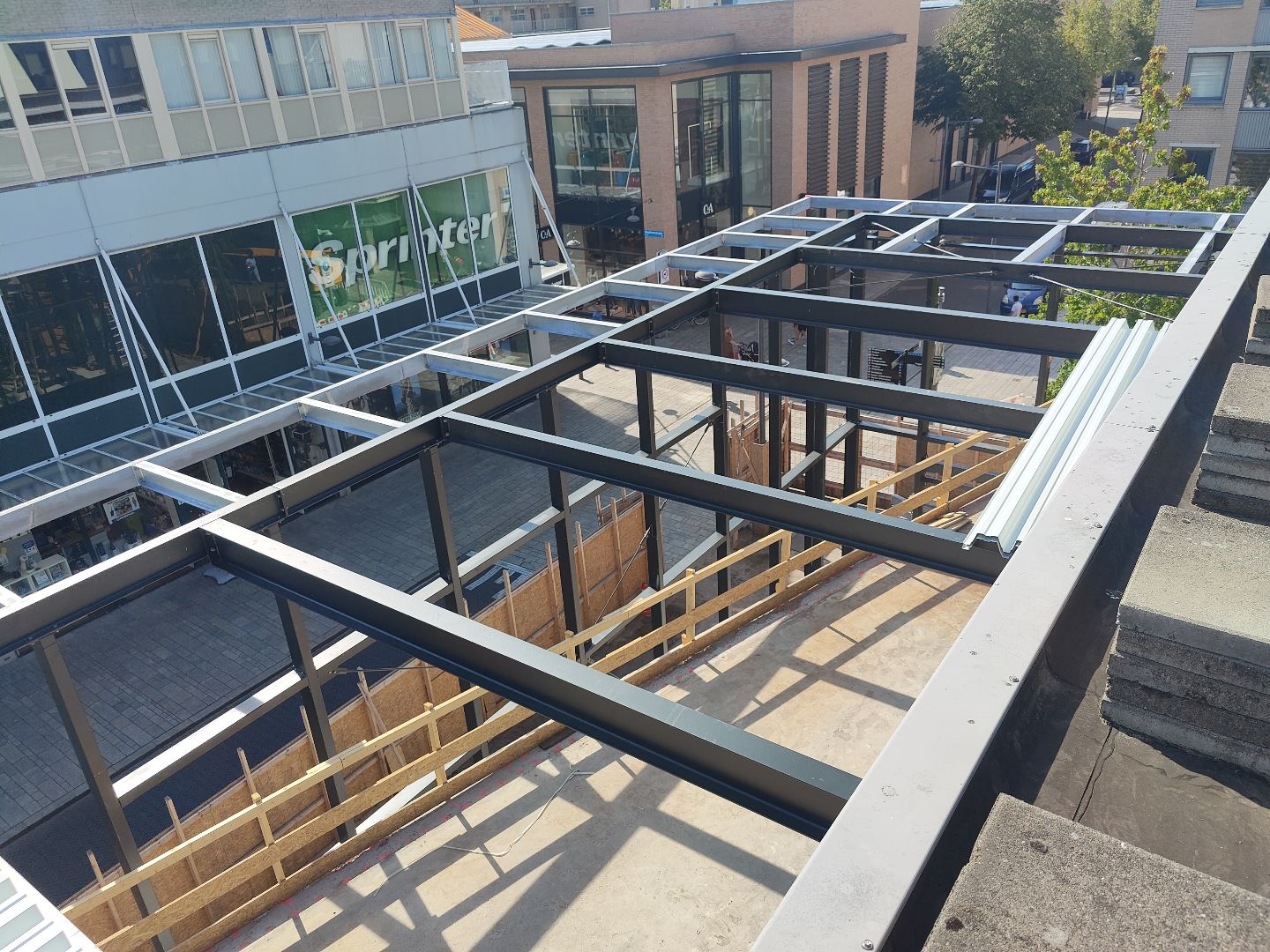 white wooden shelf near white wall