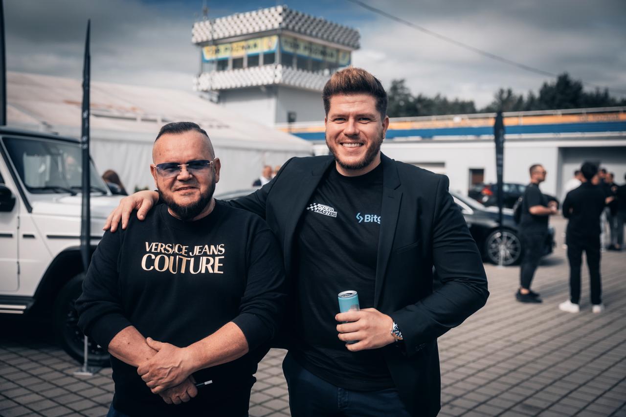 Skier with a helmet and goggles looks away.