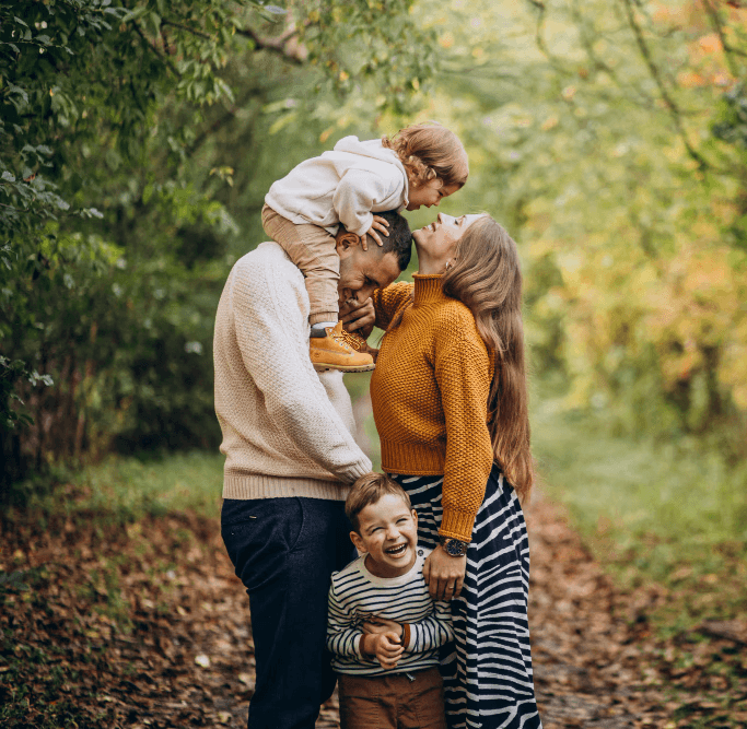Family enjoying time together outdoors, representing health insurance options for families in Ireland
