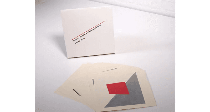 A collection of white cards featuring abstract shapes in shades of grey, black, and white, arranged artistically to represent elements of subway etiquette.