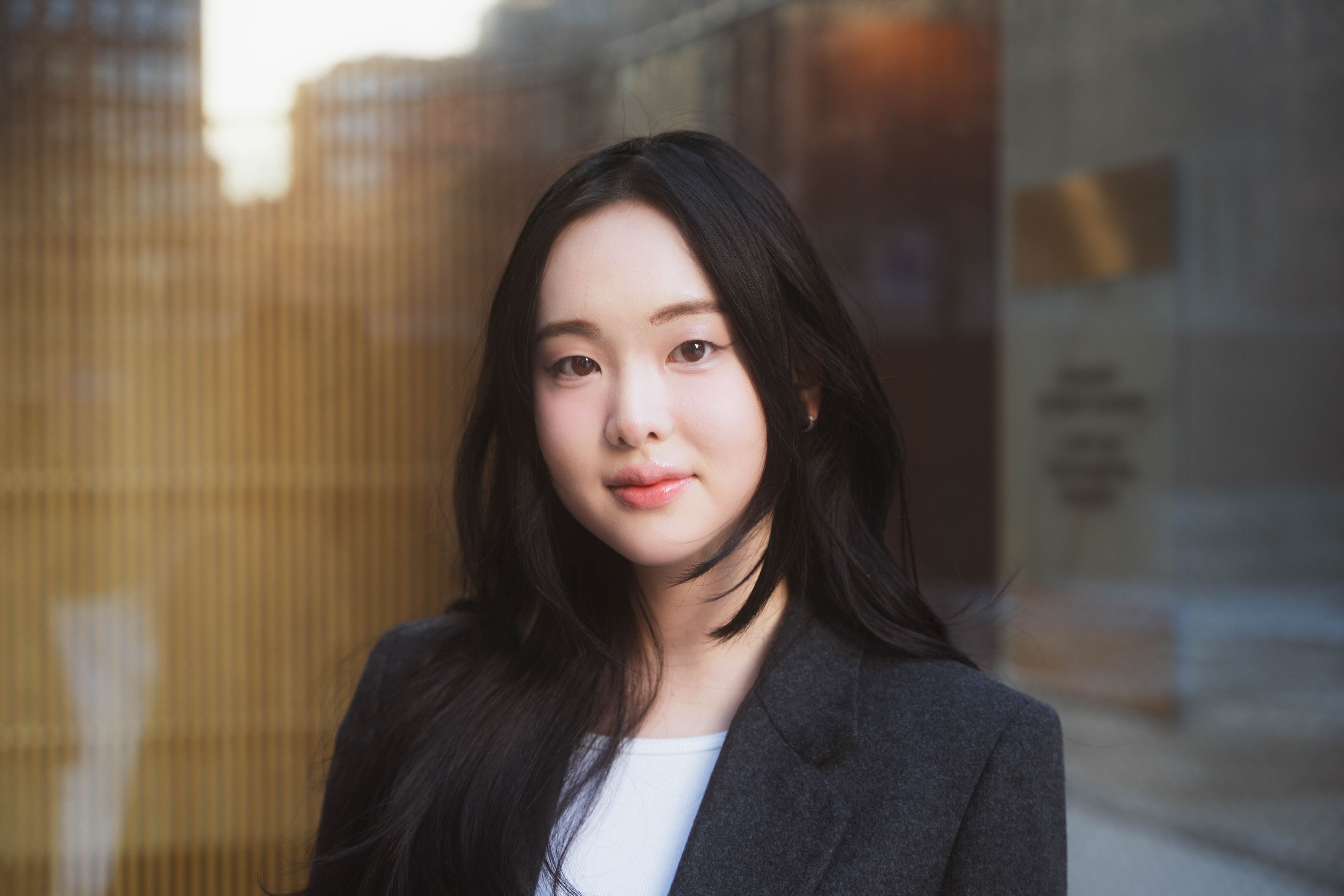 A young girl smiling