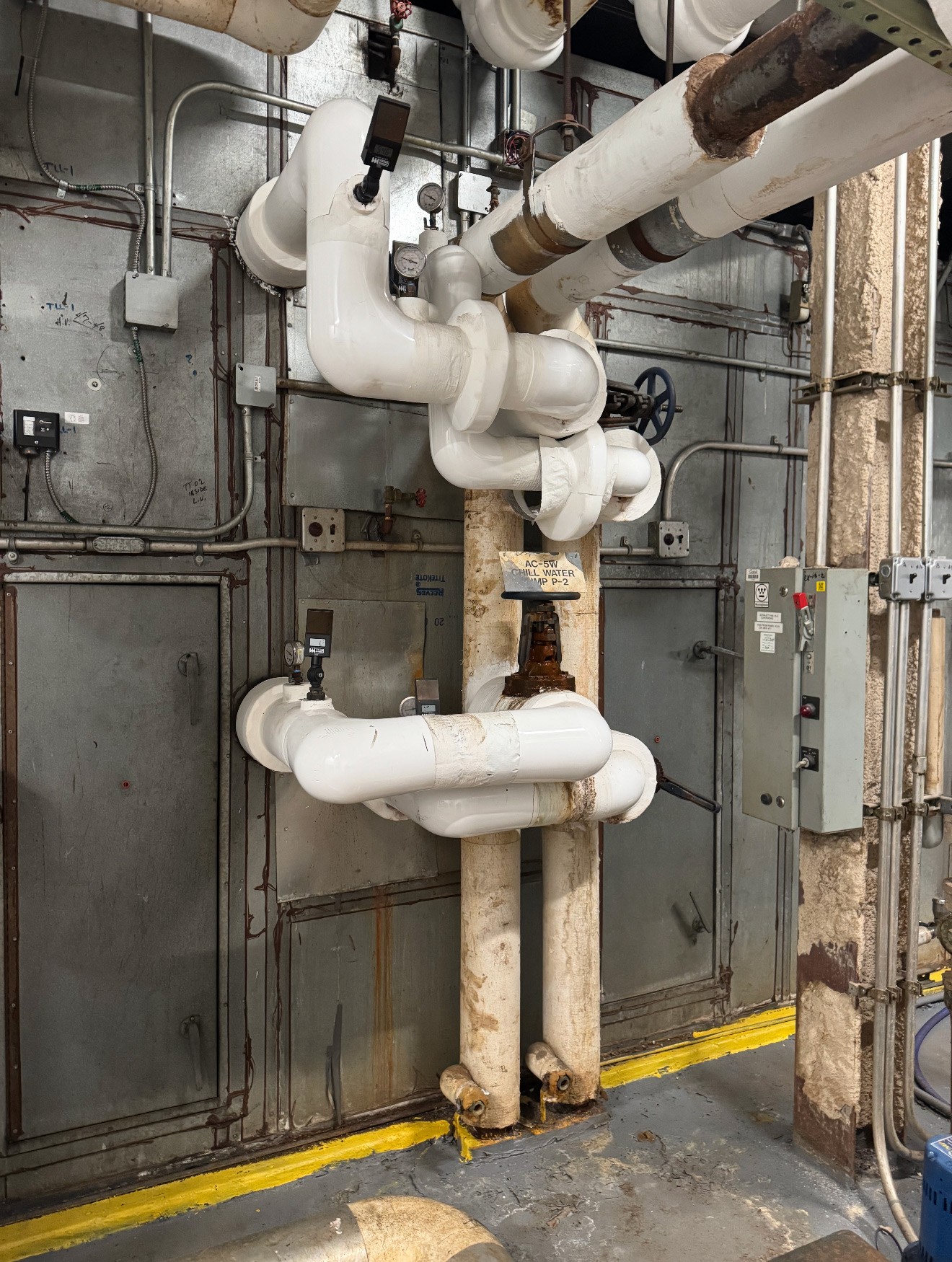 GRR Cooling Experts modified chilled water piping and insulated pipe connections for a hospital HVAC coil replacement project in New York City.