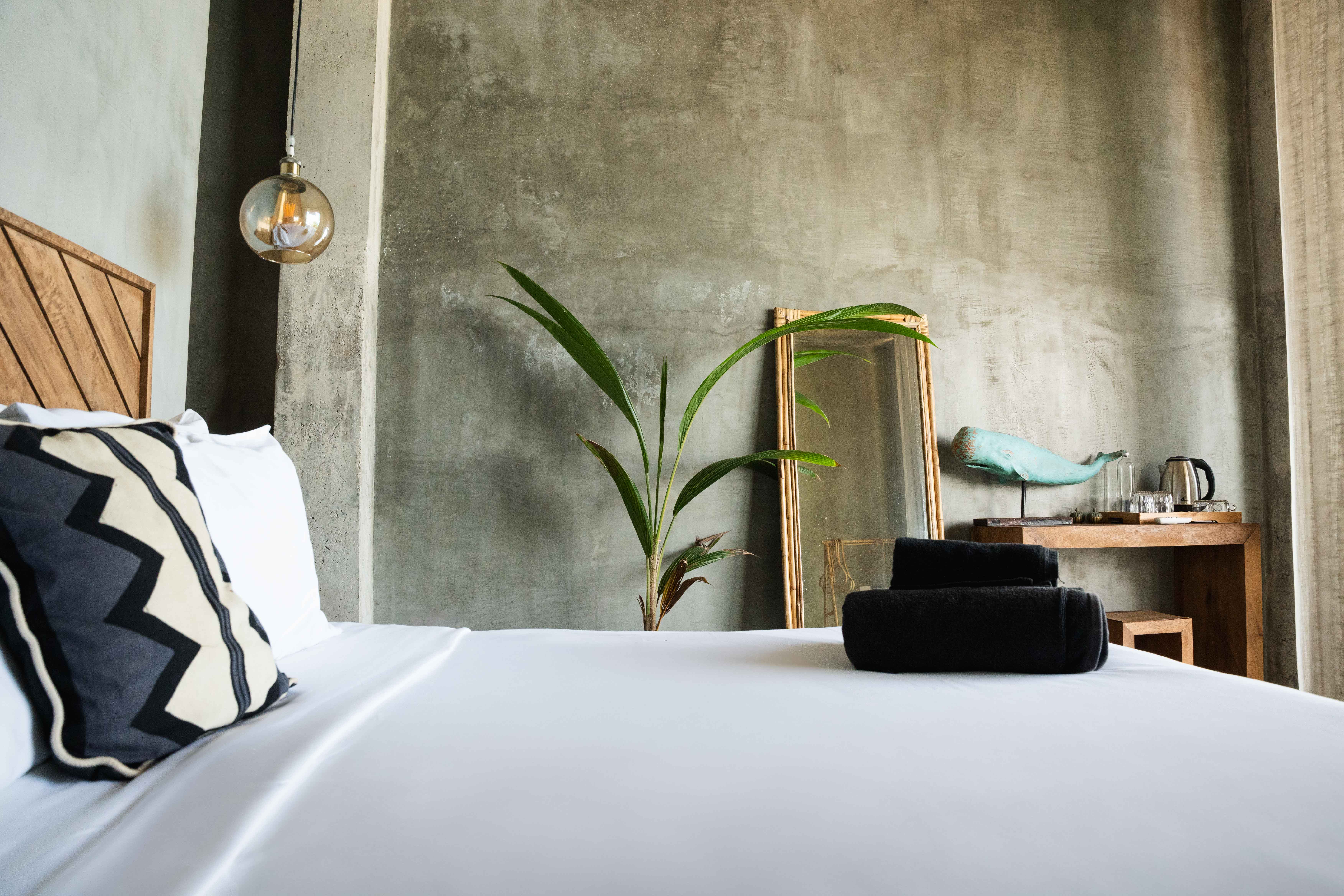 Boutique hotel room in white and beige colors 