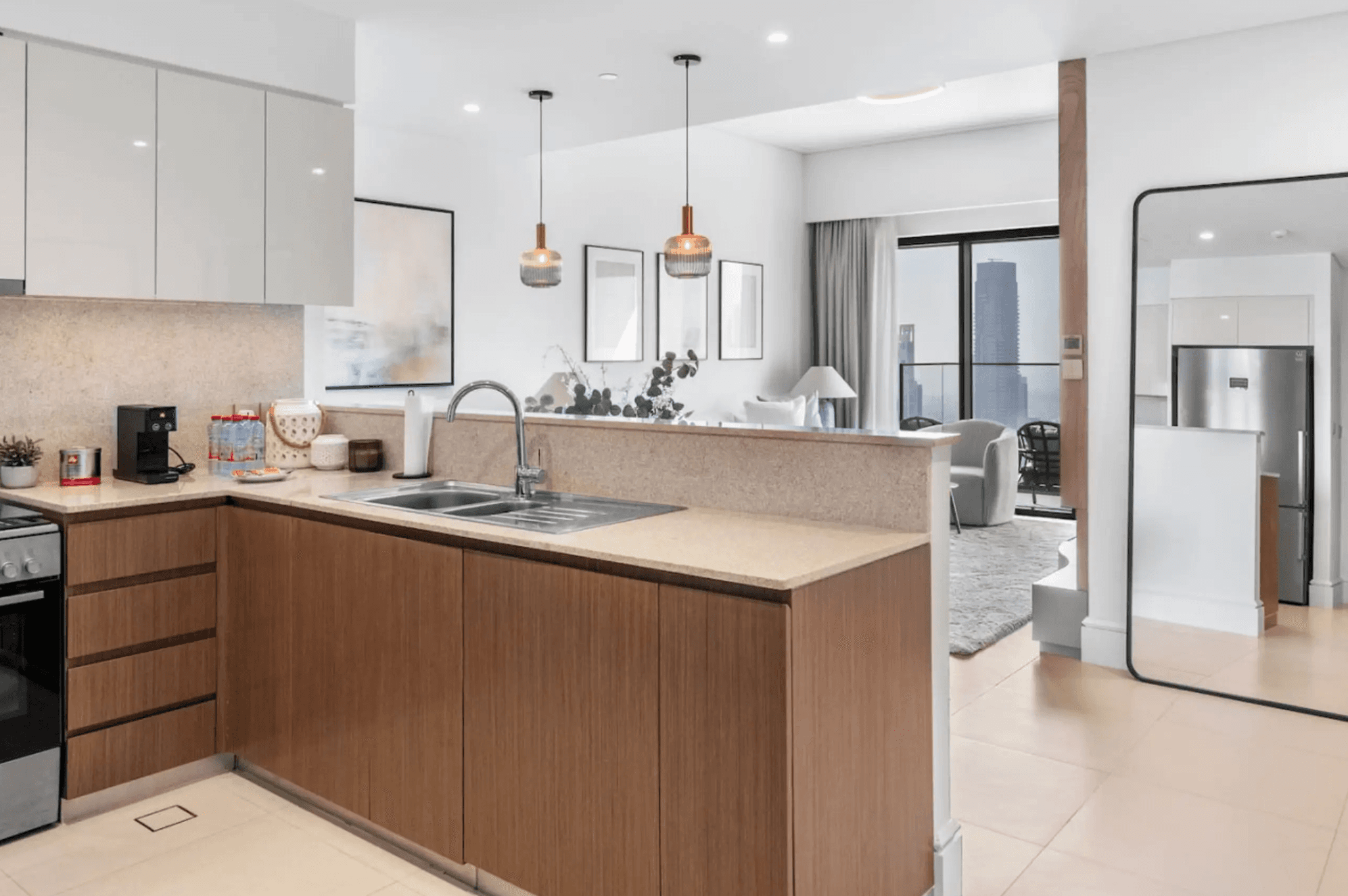 living room with brown sofa and glass window