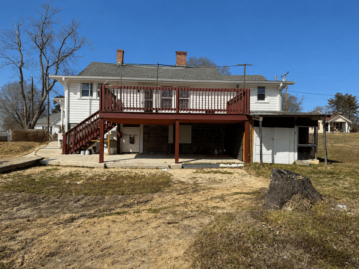 Before photo of an existing home prior to a custom room addition and breezeway renovation in Mount Airy NC.