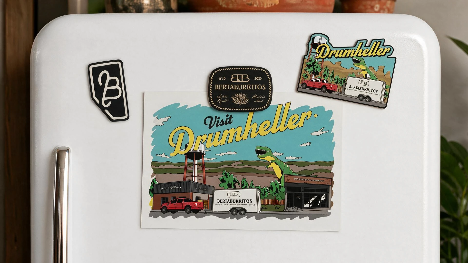 BertaBurritos merchandise featuring Drumheller postcards, magnets and branded souvenirs