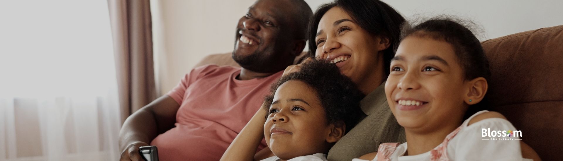 A family with father, mother, and two kids.