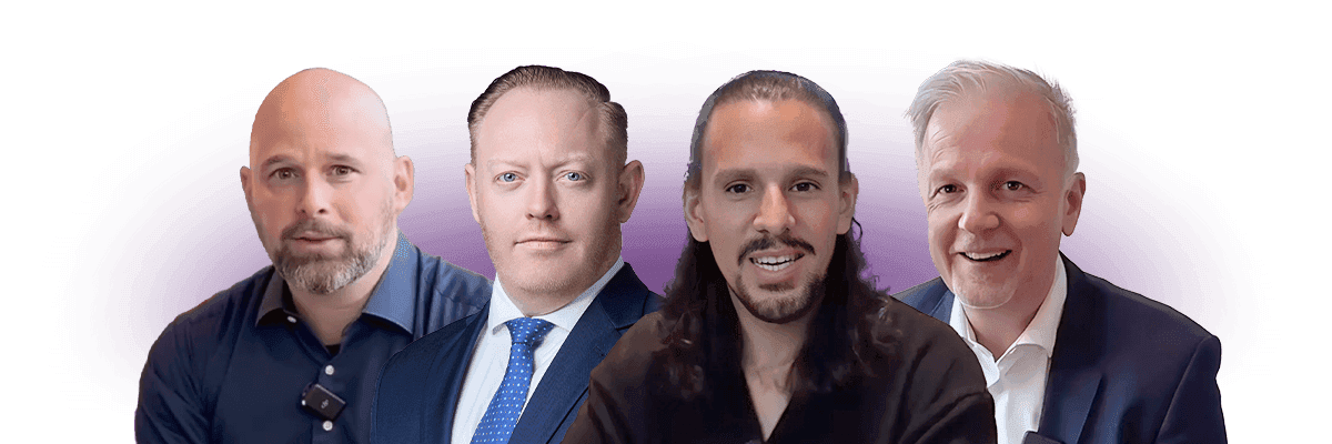 Four men are pictured in a group portrait against a purple background, each wearing professional attire and smiling.