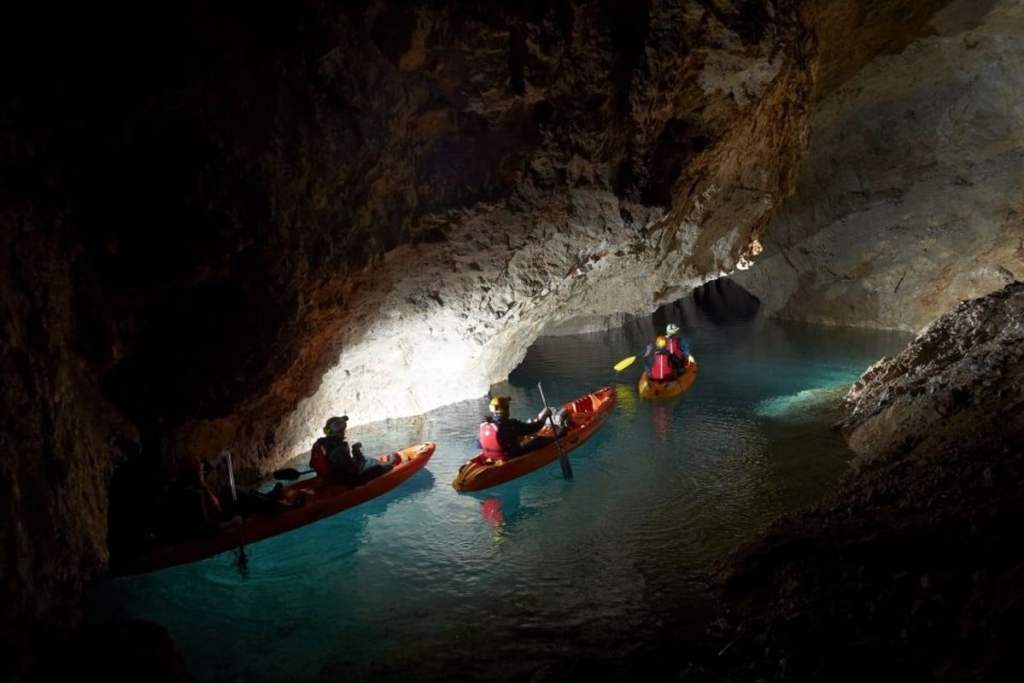 kayaking through a cave